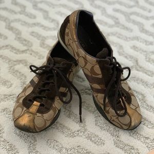 Coach tan logo sneakers with gold and brown trim